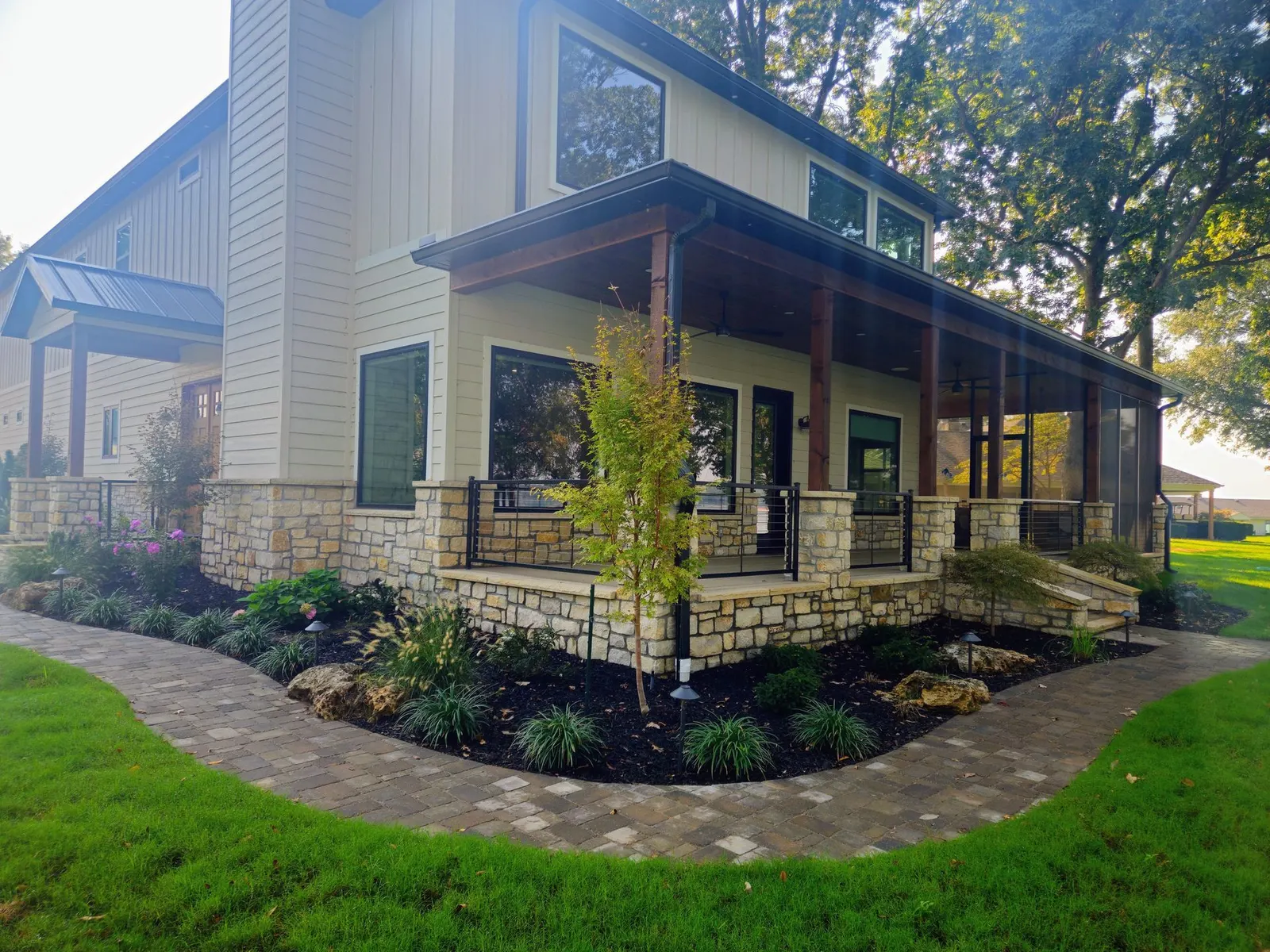 Fabricated black handrails on front steps