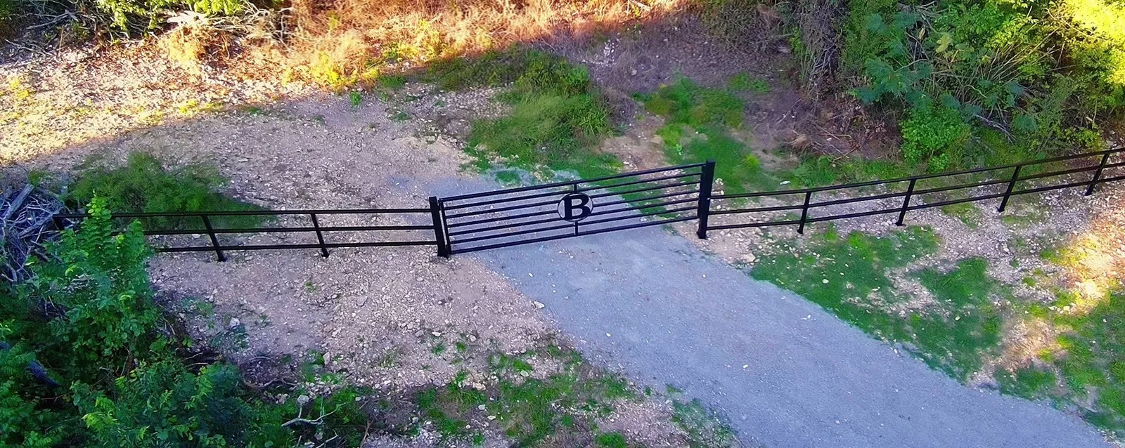 Custom metal gate and fence viewed from above