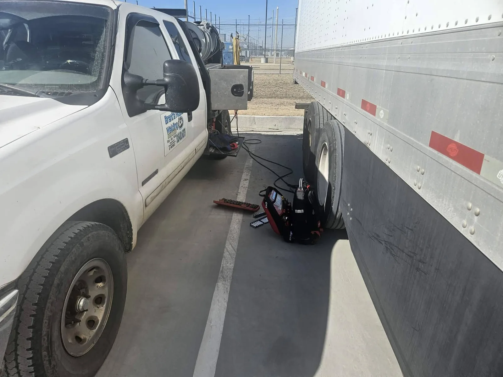 Brent's mobile welding truck working beside a trailer