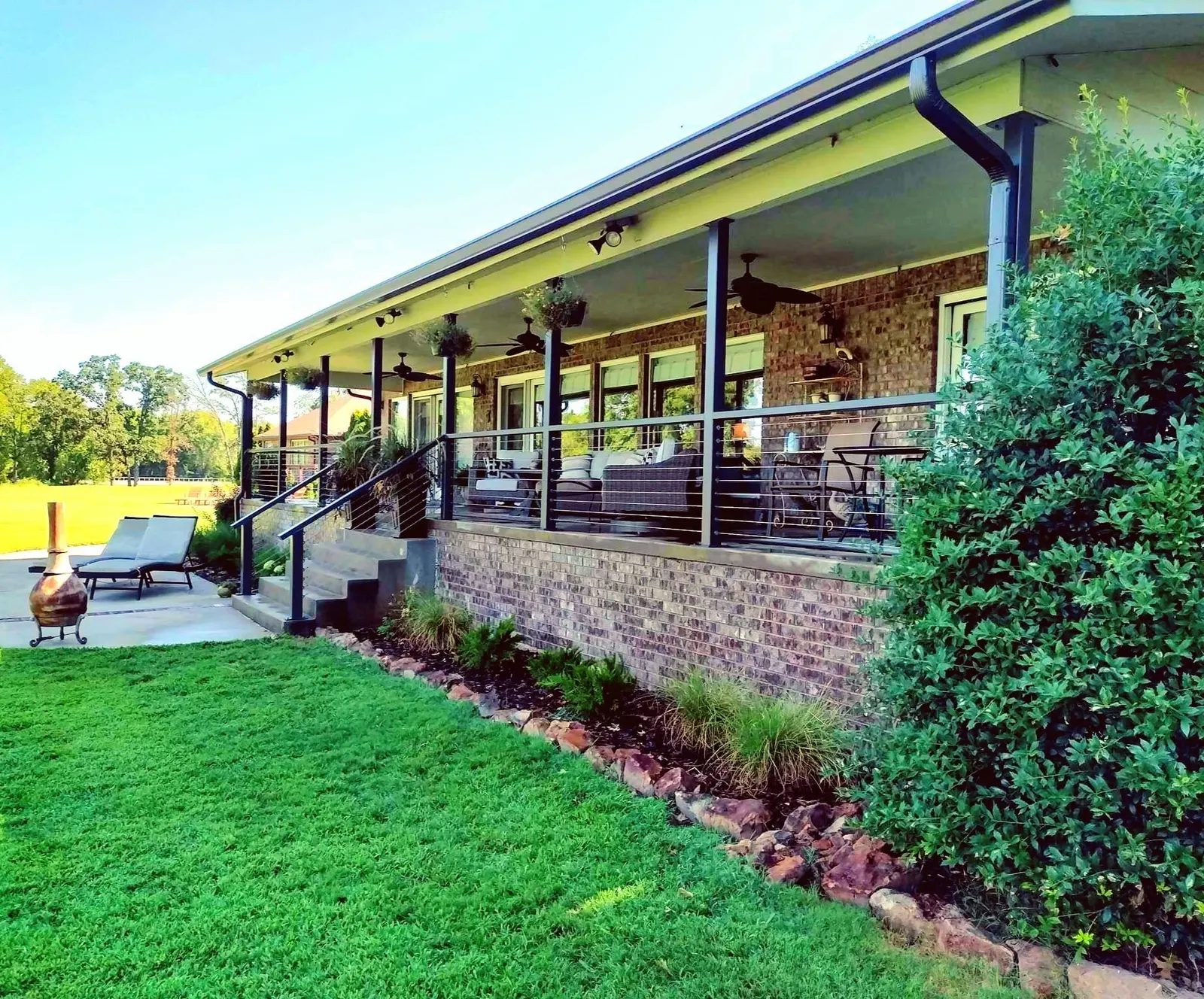 Metal porch railing with decorative panels